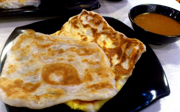 Roti Prata. Ever notice how oily food makes paper wrappers become clear? Rub roti prata on a concrete floor and it will become clear.